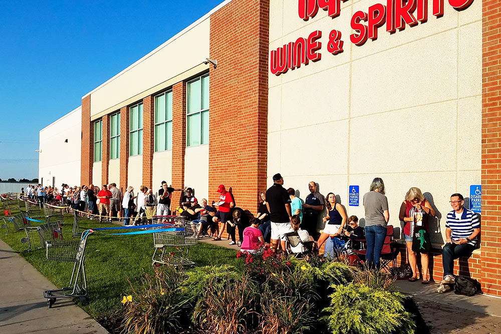Customers line up outside Springfield’s Hy-Vee this morning to buy special safety glasses to view the solar eclipse.