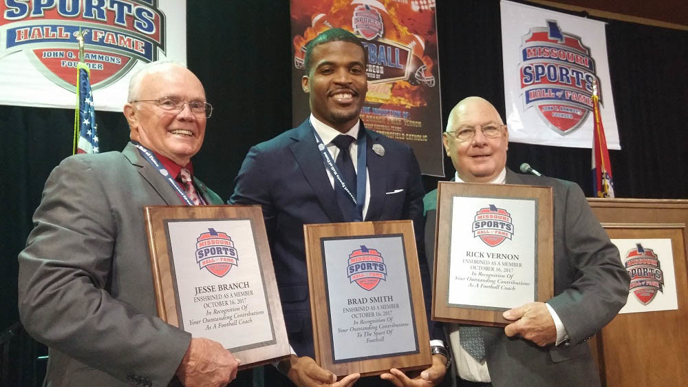 Football Kick-off
Former University of Missouri quarterback Brad Smith, above, center, and two former football coaches, Jesse Branch, far left, of Missouri State University and Rick Vernon of Waynesville High School, are inducted into the Missouri Sports Hall of Fame.