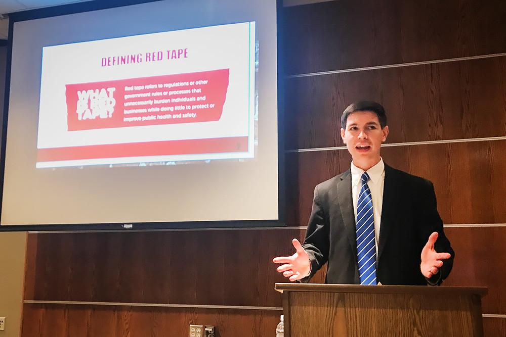 Justin Smith, deputy counsel to Gov. Eric Greitens, updates Springfieldians on the “No MO Red Tape” campaign.