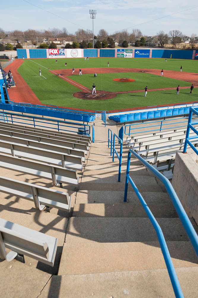 Sponsorships by companies such as KRBK and Elliott Lodging Ltd. are clearly visible inside the U.S. Baseball Park.