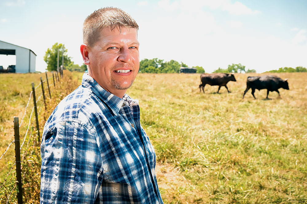 EXPENSIVE TASTES: JB Kobe Farms co-owner Justin Baker raises Japanese-bred wagyu cattle, which produces intense-marbling beef.SBJ photo by WES HAMILTON