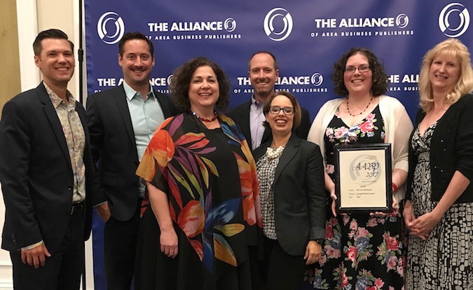 SBJ staff members accept second-place honors June 24 for best use of multimedia during the Alliance of Area Business Publishers’ summer conference in Dallas.Photo by ALLIANCE OF AREA BUSINESS PUBLISHERS