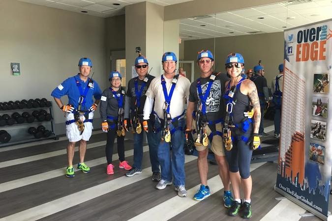 Edgers gear up June 3 before rappelling down the side of Sky Eleven. Pictured are Steve Edwards, Morghan Ansley, David Foss, Bob Cirtin, Ryan Wolf and Charlee Alexander.
