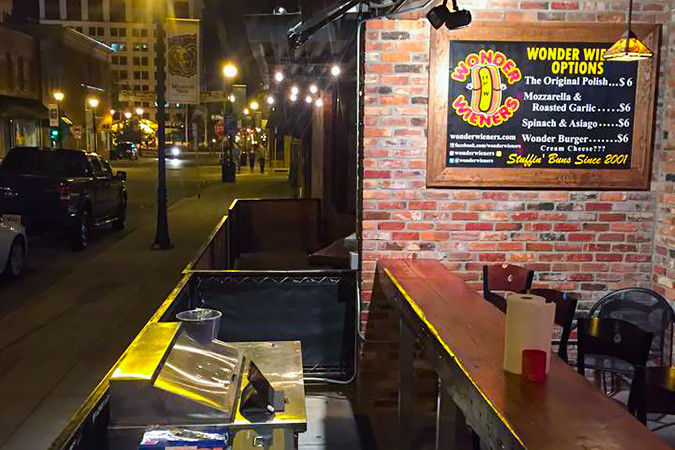 Wonder Wieners opened this outdoor kitchen at Ernie Biggs Piano Bar in October. Owner Cory Eden plans to retain the location after opening in Battlefield Mall this July. 