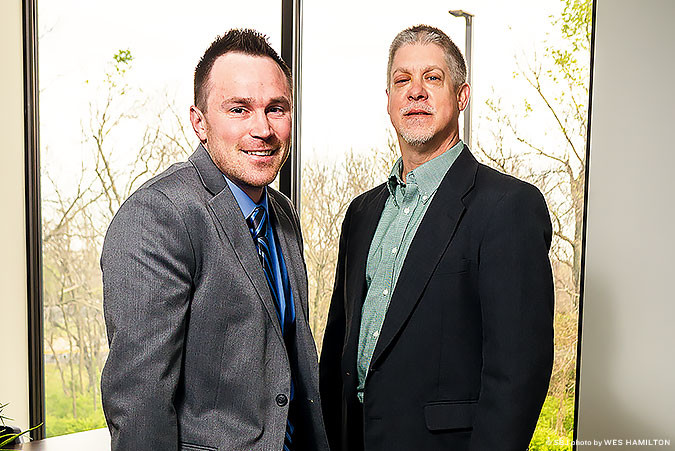 The Arc of the Ozarks consolidates four offices into a building on West Elfindale Street. Pictured are Vice President of Program Services Tim Dygon and President and CEO Mike Powers.