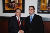 Sam Hamra, left, announced that his son, Mike Hamra, is the new president and CEO of Hamra Enterprises.