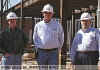 DeWitt & Associates' crews are constructing College Station's theater in downtown Springfield. On site, from left, are Project Manager Scott A. Coffman, Superintendent Leonard Gass and President Jerry L. Hackleman.