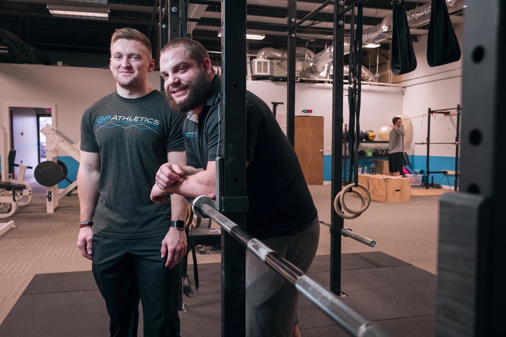 ADDING MASS: Patrick Posten, left, and Spencer Graham used an $8,000 loan to start their fitness business.