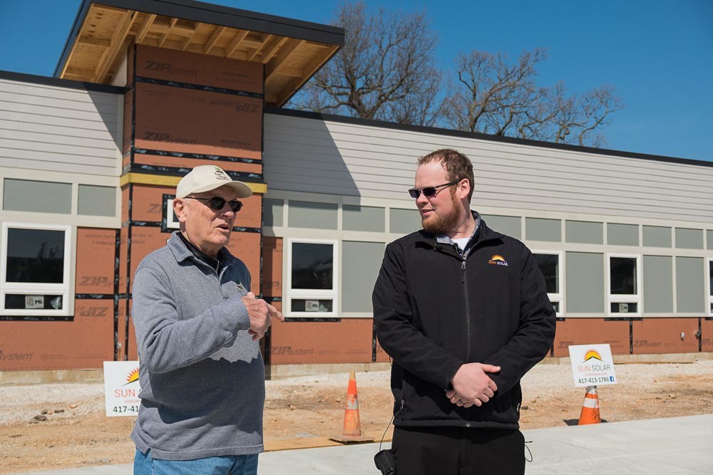 Tiny, Efficient Homes
Sun Solar LLC plans to power Springfield tiny homes development Eden Village. Above, Eden Village’s Dr. David Brown, left, and Sun Solar CEO Caleb Arthur announce the partnership April 10. Sun Solar is using its community partner program to donate a panel for every new contract the company signs through May 10.