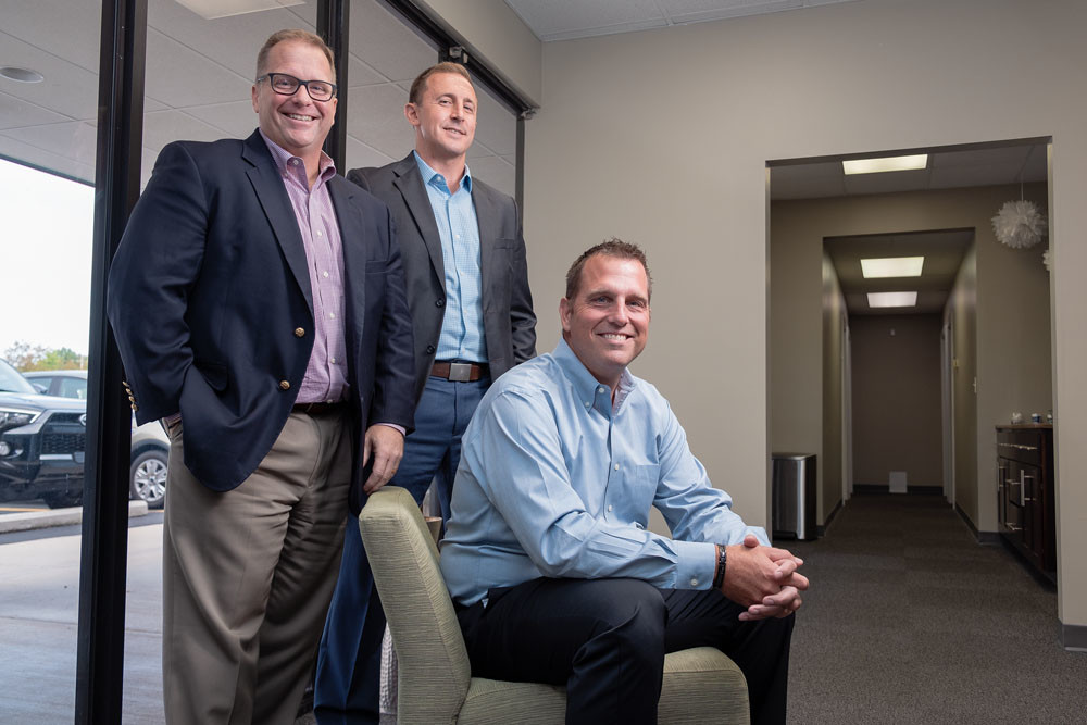 REMOTE CONTROL: Torrey Barnhouse, co-owner; Josh Kerns, CFO; and Jason Barnhouse, VP, partnership and innovation, are part of the leadership team at Trust Healthcare Consulting Services. The company’s staff is 97 percent remote.
