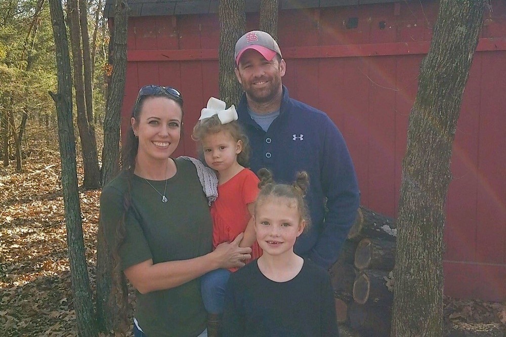 Scott Rothrock, pictured with his wife and two daughters, died Dec. 28.