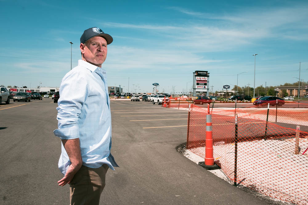 Restaurateur Michael Felts stands last spring at the planned site of Taco Habitat. Due in part to the government shutdown, Felts is uncertain when the project will move forward.
