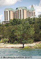 John Q. Hammons' vision for an upscale resort overlooking Table Rock Lake came to fruition in 1997. Sales are growing 3 percent to 4 percent each year, Hammons says.