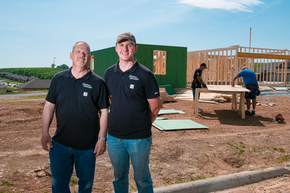 Bussell Building co-owners Kenny and Tyler Bussell say a shortage of new homes is driving their construction business.