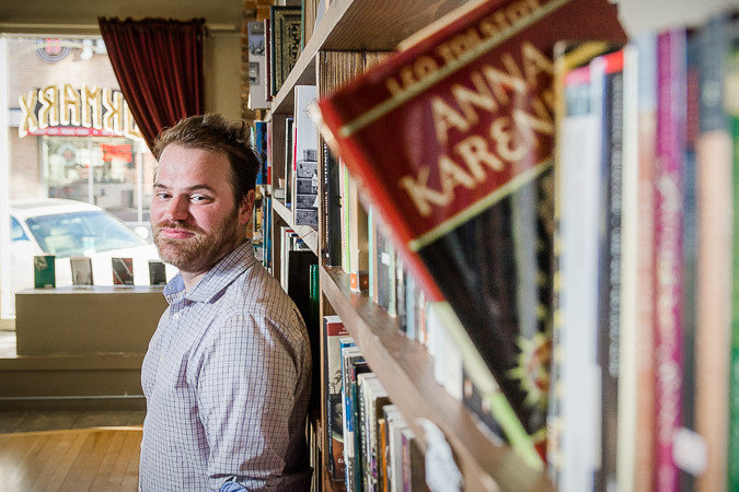 Josh Arnett, pictured at BookMarx in 2016, is closing his downtown shop.