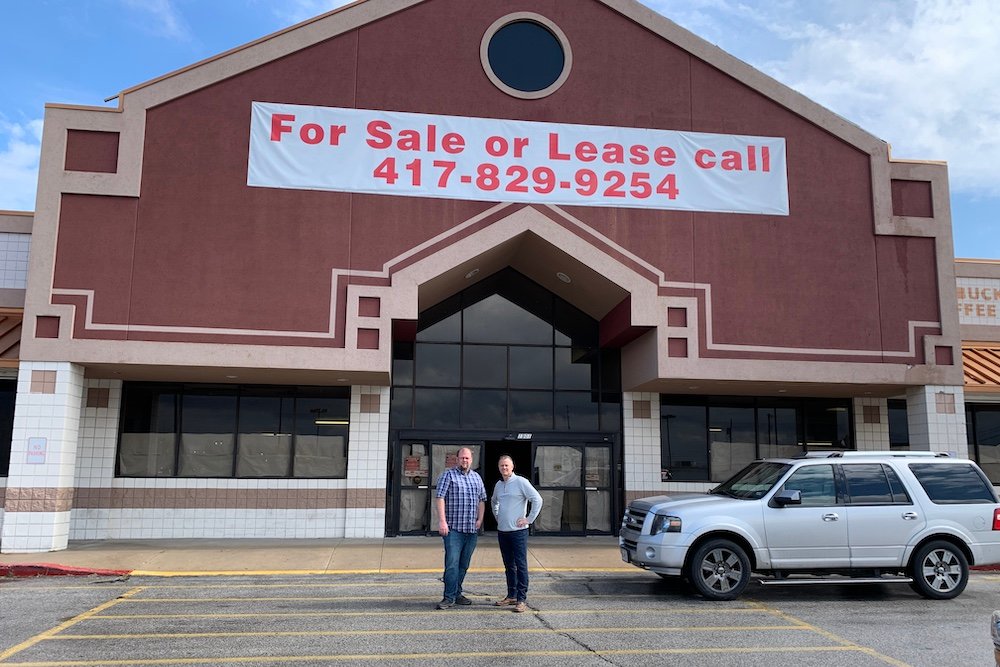 Life360 Community Services Executive Director Jeremy Hahn, left, and board President Ted Cederblom stand outside the recently leased Price Cutter building at 1901 E. Division St.