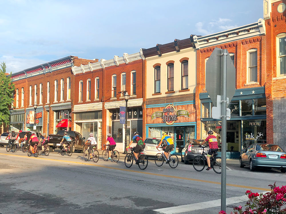 DISTRICT VIBE: The city has updated guidelines to the Commercial Historic District Development Plan. Activity on the street is shown here last summer.