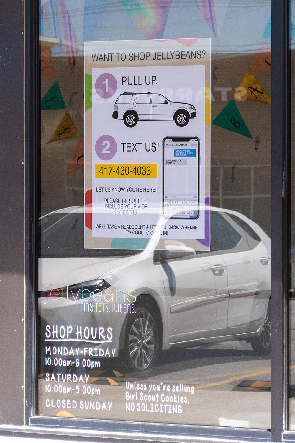 On Jellybeans' front door, a new system outlines how guests should enter the store.