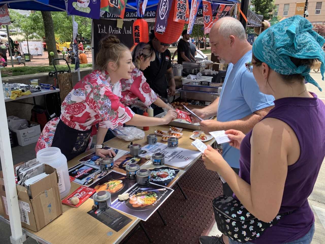 Customers attend the 2019 Taste of SoMo event in downtown Springfield.
