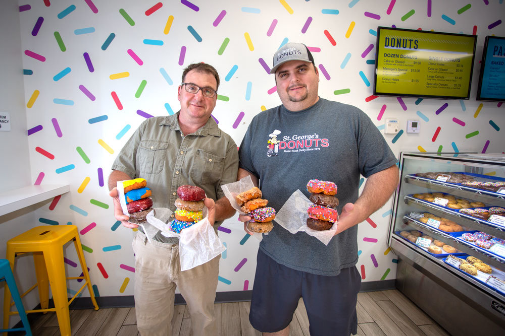 FAMILY FLAIR: Brothers Kevin and Nick St. George take their own approach — in recipes and operations — for their independently run doughnut shops.