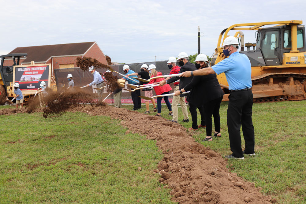 BREAKING SCHOOL GROUND
Springfield Public Schools officials kick off the start of renovation and expansion of Williams Elementary School by tossing dirt during an Aug. 11  groundbreaking ceremony. Nabholz is general contractor for the estimated $15.7 million job at Williams.