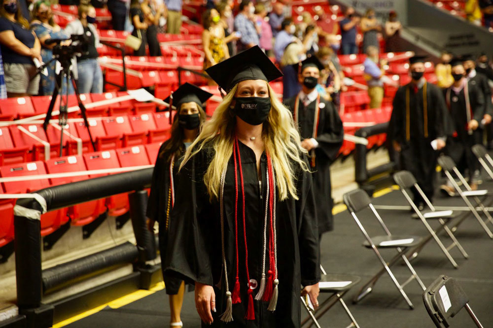 ‘IN ANY ENVIRONMENT’
During commencement ceremonies held Aug. 14-15, Drury University graduated 479 students from its spring and summer programs. Traditionally held in May, the ceremonies were postponed and structured with social distancing protocols – both for graduates on the floor and guests in the stands at the O’Reilly Family Event Center. Drury President Tim Cloyd and Alumni Council President John Pope addressed the graduates. “You are now tasked with going out into the world and putting your talents, skills and Drury education to work,” Pope said. “And while this world seems a lot different than it did a year ago, don’t forget that Drury has been preparing you all along to succeed and thrive in any environment.”