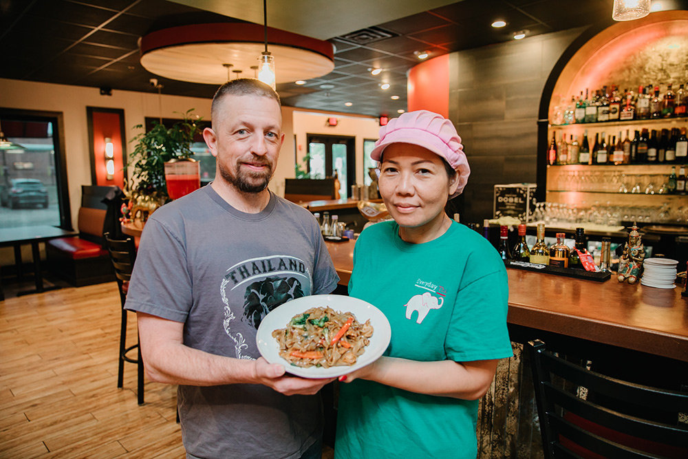 Steven and Thippawan Shutts display their Pad Kee-Mow dish, aka drunken noodles, which he describes as having a wide flavor profile.