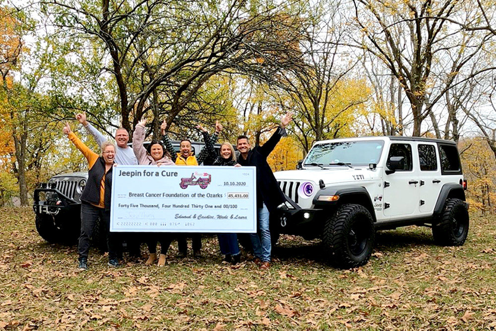 JEEPS THAT CARE
Jeepin for a Cure event organizers Oct. 26 present a $45,000 donation to Breast Cancer Foundation of the Ozarks executives Allyson Tuckness and Joe Daues, center. The money was raised during a Jeep ride organized by the group to help raise awareness of breast cancer treatment and services. Representing Jeepin for a Cure is committee members Laura and Wade Messersmith, far left, and co-founders Candice Reed and Edmond McClure, far right. There were 285 Jeeps participating this year, beating the goal of 200, organizers say. The next annual event is scheduled Oct. 16, 2021.