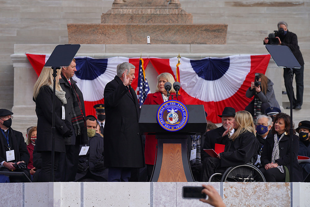 INAUGURATION DAY
Gov. Mike Parson on Jan. 11 is sworn in after defeating state Auditor Nicole Galloway at the polls in November. It’s the first elected term as governor for Parson, who took over in 2018 after the abrupt resignation of former Gov. Eric Greitens. Parson was sworn in by Judge Sarah Castle, who represents the 16th judicial circuit in Jackson County. In Jefferson City, Springfield-area resident Scott Fitzpatrick also was sworn in as treasurer.