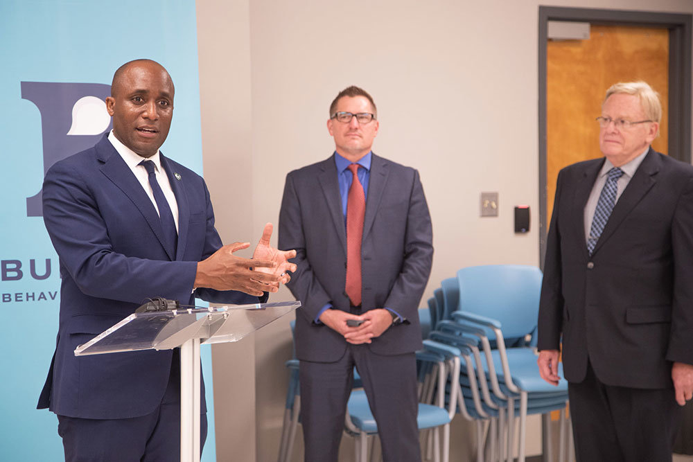 CITY TOUR
As part of his June 11 visit to Springfield, Kansas City Mayor Quinton Lucas, left, tours Burrell Behavioral Health’s Behavioral Crisis Center with the nonprofit’s President and CEO C.J. Davis and Springfield Mayor Ken McClure. The center provides a walk-in clinic for adults in need of immediate psychiatric care, treatment for opioid use or a psychiatric assessment. The mayors also met with Springfield Police Department Maj. Tad Peters to discuss the collaboration between the police department and the health care provider.