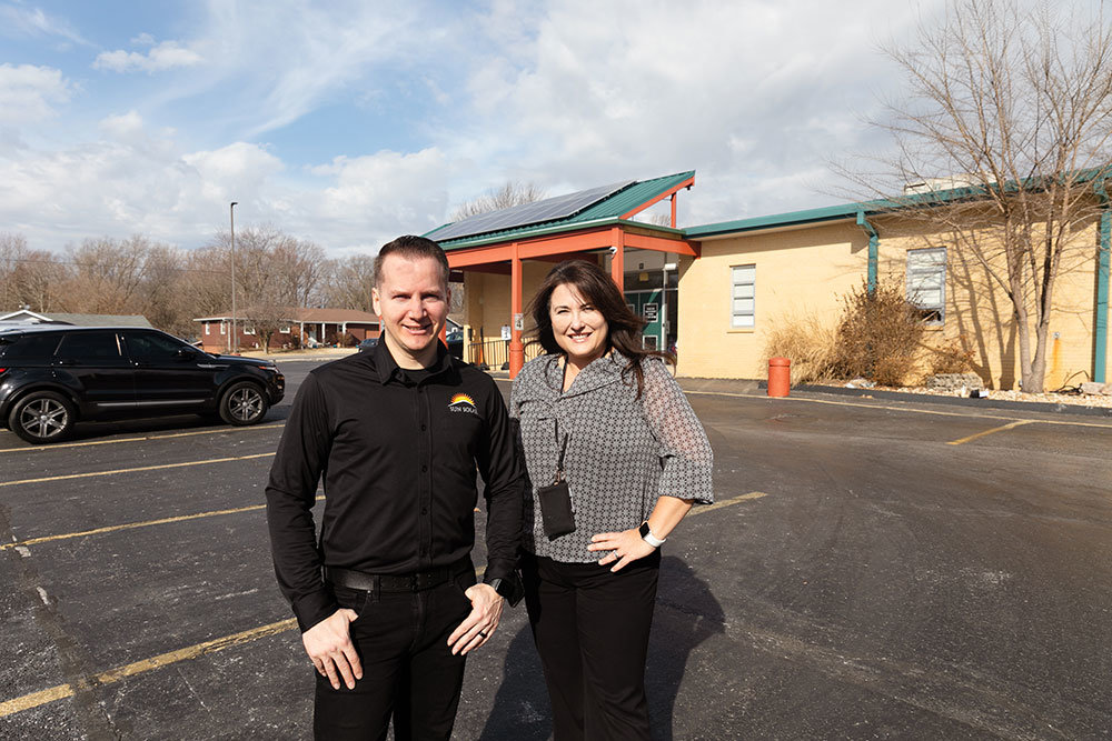 Sun Solar's Tyrone Galgano, with John Thomas School of Discovery Principal Jennifer Chastain, says the donor-funded solar array at the Nixa school produces 7,247 kWh of energy.