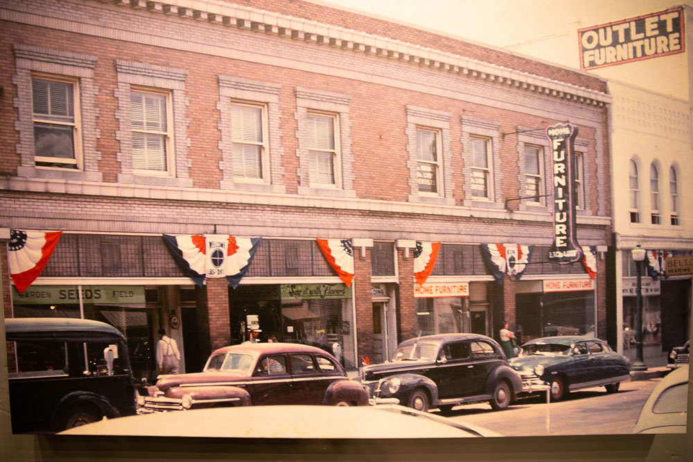 In a 1952 photo celebrating President Harry S. Truman's visit to Springfield, J.L. Long & Sons Furniture & Carpet Co. filled space now partially occupied by Flame Steakhouse.