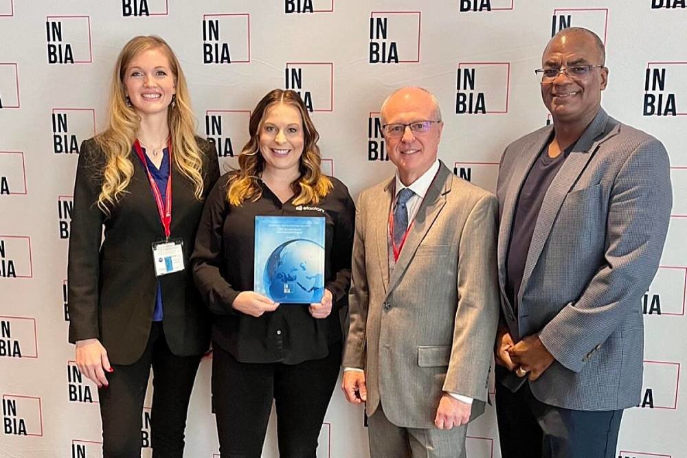 The Efactory’s Rachel Anderson, second from left, accepts the award at the International Conference on Business Incubation of the International Business Innovation Association.
