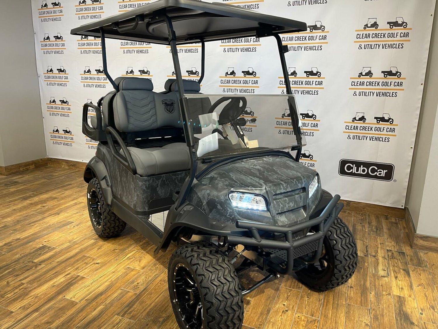 A raffle is being held for a Clear Creek Golf Car vehicle.