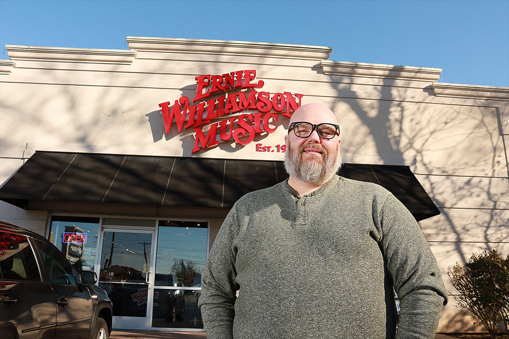Ernie Williamson Music owner Donovan Bankhead says unifying his stores under one name required a brand overhaul.