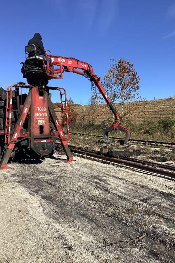 Rail Material Salvage crews remove railroad ties and rails in preparation for trail work along South Kissick Avenue in southern Greene County.