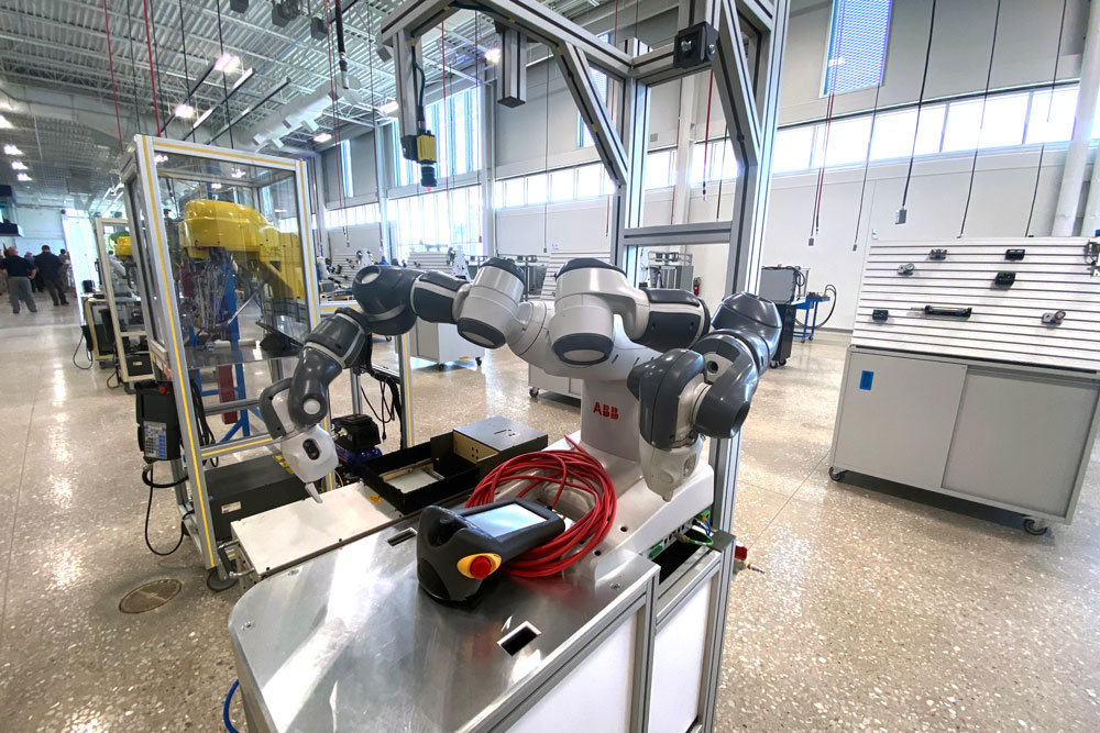 Students can familiarize themselves with advanced manufacturing equipment, like this robotic arm, at the PMC.