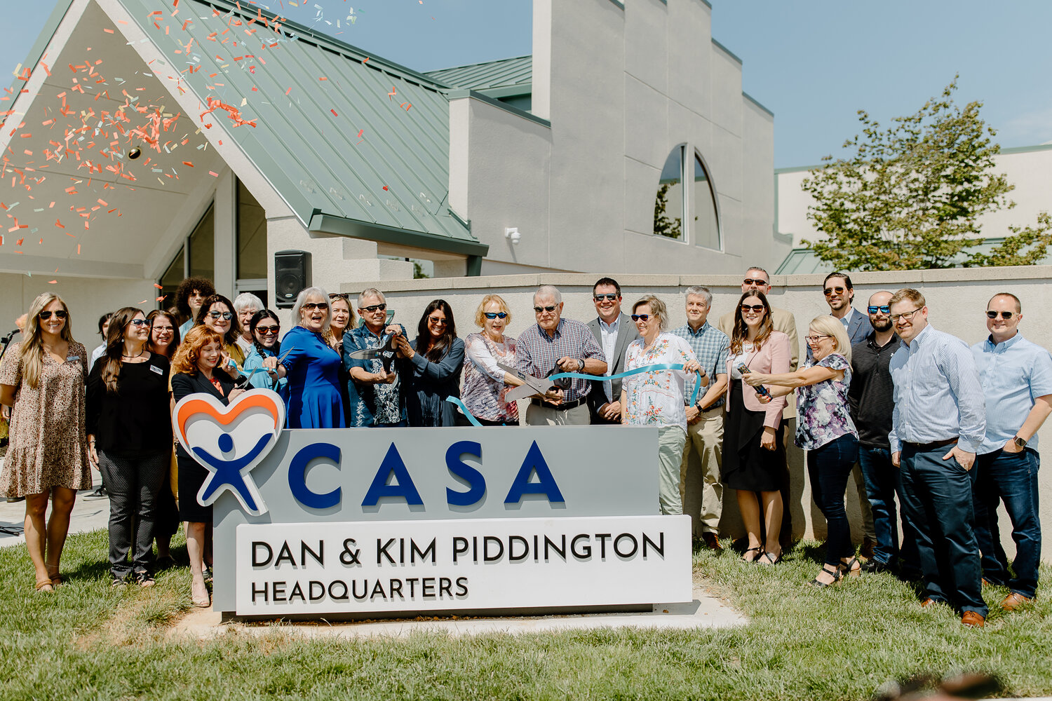 A ceremony marks the opening of CASA's new headquarters, 627 N. Glenstone Ave.