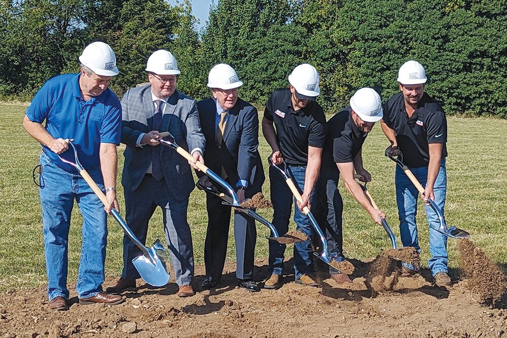 From left: Rich Kramer Construction co-owner Richard Kramer, Springfield Area Chamber of Commerce CEO Matt Morrow and Springfield Mayor Ken McClure turn dirt with Dakota Brede, Dustin Watson and Justin Peck of Sho-Me Fabrication.