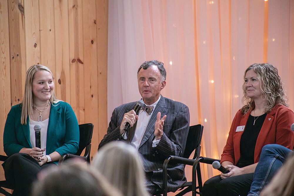 Community Foundation of the Ozarks President Brian Fogle shares challenges facing nonprofits at an Oct. 24 Springfield chamber event, as fellow panelists Jessieca Hollister-Graham, left, and Laura Farmer, look on.