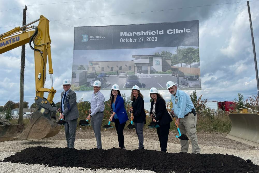 State and Webster County officials join Burrell Behavioral Health representatives at an Oct. 27 groundbreaking ceremony for a new Marshfield clinic.